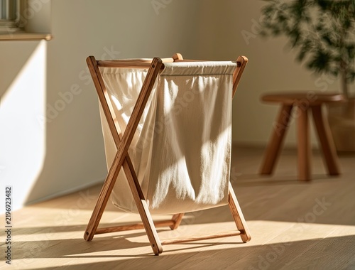 Minimalist Wooden Laundry Hamper with Natural Fabric Bag.
