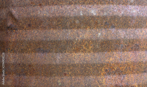 Obraz na plátně Rusted metal surface shows weathered corrosion and irregular texture