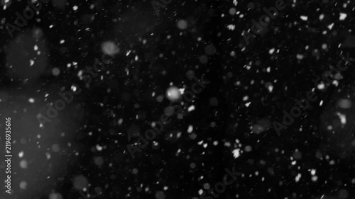 White snow isolated on black background, natural and real, winter nature, using for overlay effect