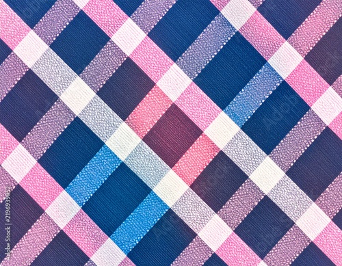 Seamless pattern pink and blue plaid fabric texture with woven thread pattern