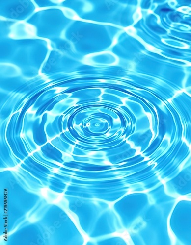 Clear blue transparent water texture. Swimming pool background.