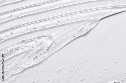 Texture background of transparent body cosmetics. Copy space