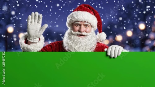 Christmas Banner template, Realistic Santa Claus Waving Hand Behind Blank Green Panel with Copy Space for Christmas Greeting Card