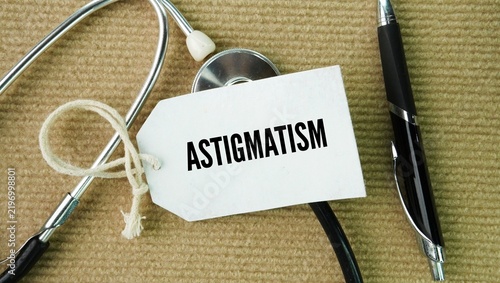 Fotografía Stethoscope and paper with the word Astigmatism