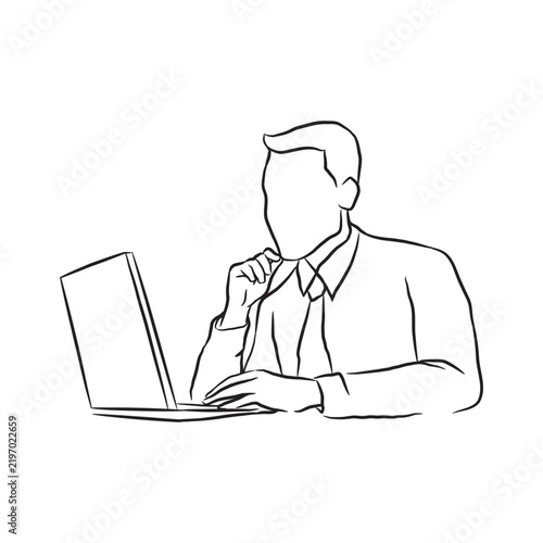 Businessman working on laptop computer.