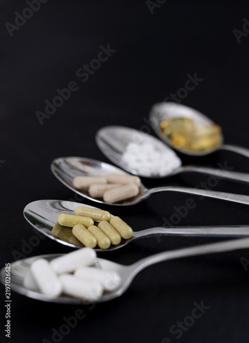 Close-up of essential gym supplements, vitamins and magnesium for training