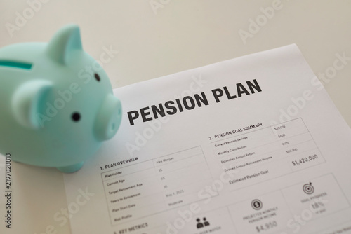 Фотография Pension retirement savings piggybank investment finance document