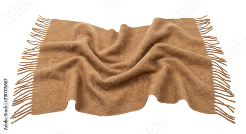 Cuadro en lienzo Soft, light brown woolen blanket with fringe edges is casually draped and wrinkl