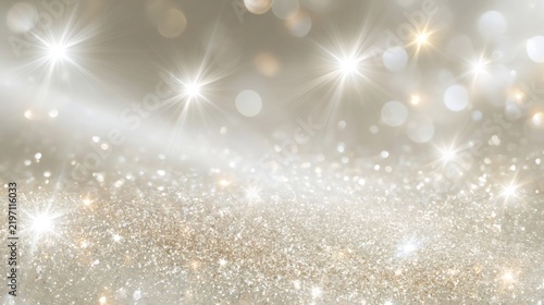 Glittering champagne sparkles creating festive bokeh background