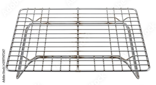 Obraz na płótnie Shiny rectangular stainless steel cooling rack, elevated on small feet, is preci