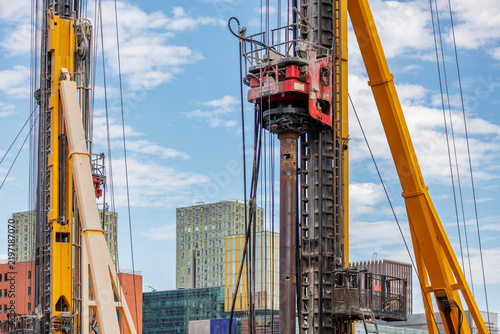 Large pile drivers on a construction site in Kop van Zuid, Rotterdam, The Netherlands