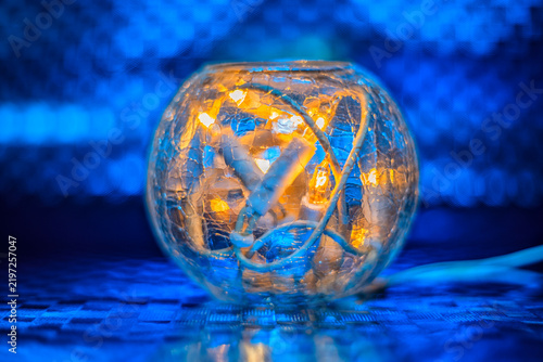 Round lamp with electric candles inside