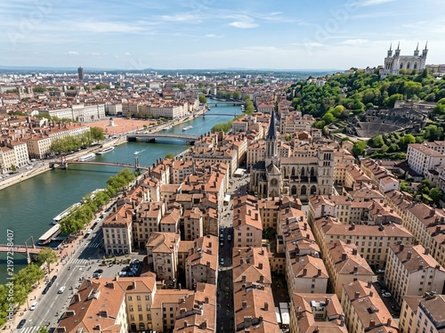From above, the historic center of Lyon appears under a bright spring sky in France