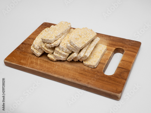 Canvastavla Sliced tempe or tempeh, a traditional Indonesian food made from whole soybeans t
