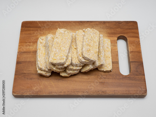 Canvastavla Sliced tempe or tempeh, a traditional Indonesian food made from whole soybeans t