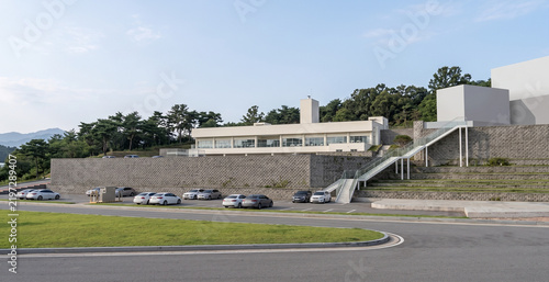 3d architectural rendering of a modern educational facility in the park