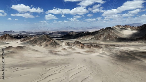 Foto Black Dushan continuous rolling desert gobi terrain landscape
