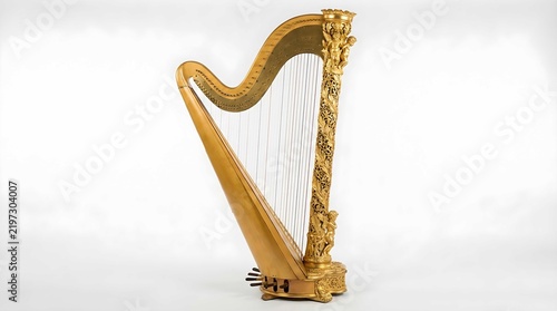 Elegant golden classical harp with intricate carvings, showcasing traditional craftsmanship and timeless musical heritage in a studio setting