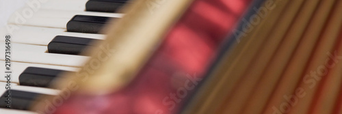 Foto Vintage musical instrument keyboard with blurred keys and colorf
