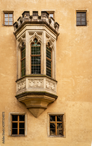 Bild auf Leinwand Gothic oriel bay window on historic castle facade