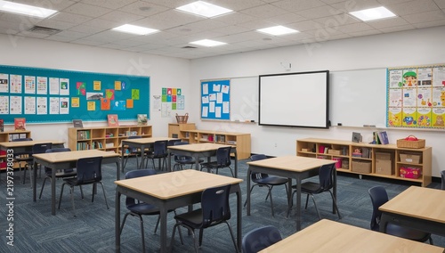 Classroom Setup With Desks, Shelves, and Educational Materials in a School