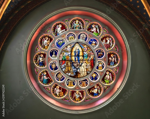 Fotografie Full rose window with religious figures at Frigolet Abbey