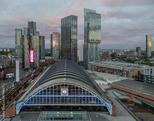 Fotografie Manchester Central Convention Complex in Manchester city centre, England, featuring the distinctive arched former railway station and surrounding modern urban development