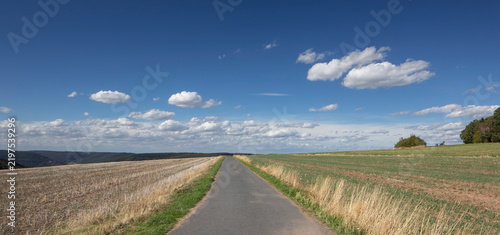wide open country with road to the sky