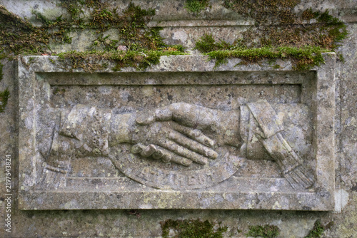 Obraz na plátne A weathered tombstone in a Cornish Churchyard