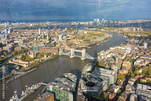 London cityscape with Tower Bridge over Thames river and Canary Wharf, UK