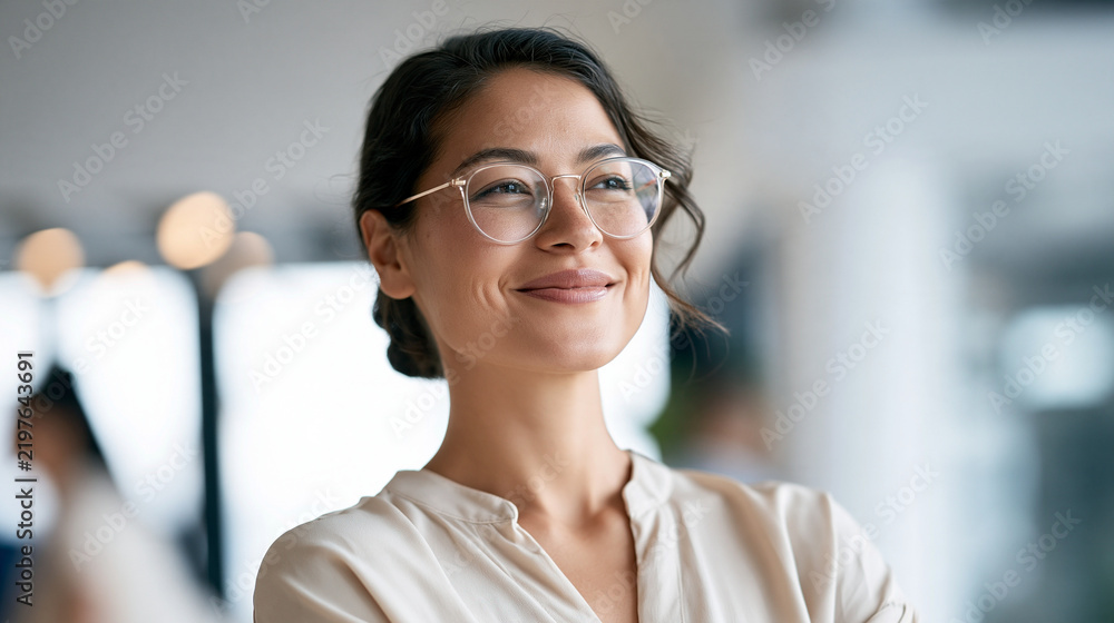 Fototapeta premium Cropped portrait of a woman wearing glasses in soft natural light bright clean well lit lifestyle photography professional look confident expression everyday elegance contemporary