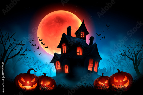 spooky, kid friendly halloween background with a haunted house with jackolanturns and bats flying around a dark night sky with a large glowing moon