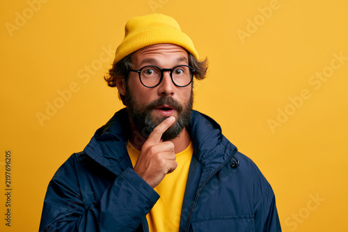 Surprised Man Thinking in Yellow Beanie Portrait
