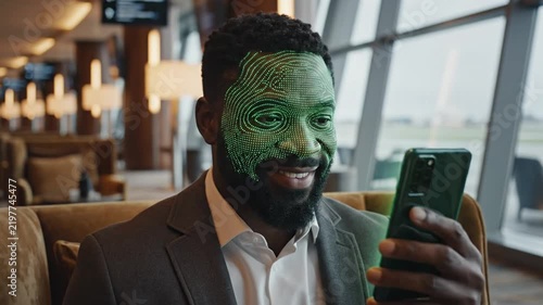 Man uses smartphone for biometric facial recognition scan futuristic technology concept