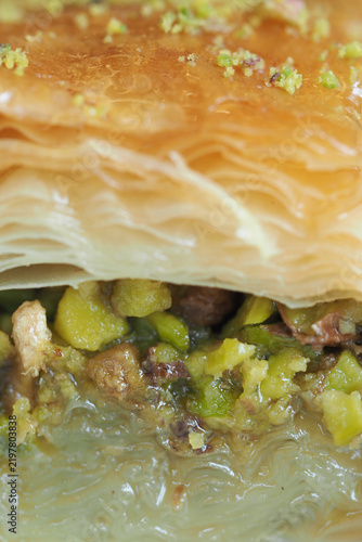 Bild auf Leinwand Baklava with layers of pastry and filling served on a plate