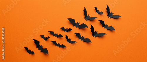 Black Paper Bats Flying on Orange Background, Halloween Decoration