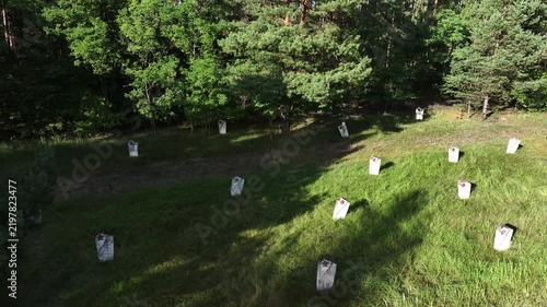 Aerial Torun Poland Soviet soldiers cemetery forest climb 1. Stalag XXI-C was a German Army World War II prisoner of war camp. Memorial is mass graves of over 14,000 prisoners executed. Historical.