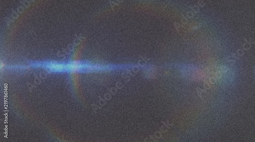Grainy horizontal lens flare with rainbow diffraction rings
