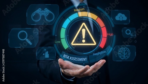 Man's hand presenting a digital risk assessment gauge with warning icon during a business presentation