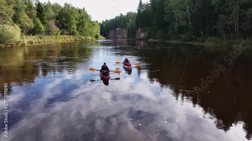 Kayakers Paddling on the Gauja River Near Ērgļu Cliffs in Latvia