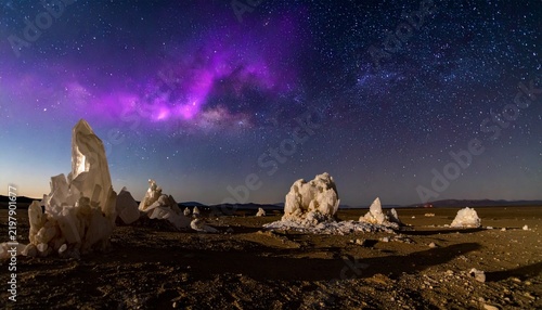 Giant glowing quartz crystal formations under a purple night sky with stars