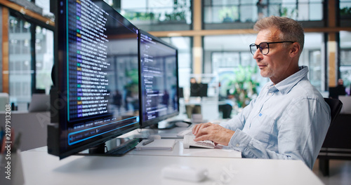 Plakat w ramie Experienced Software Developer Coding Remotely