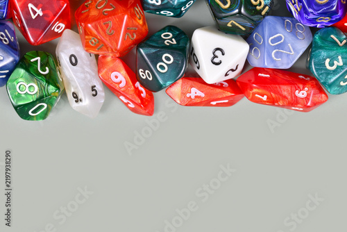 Fotografía Different colorful roleplaying RPG dice with copy space