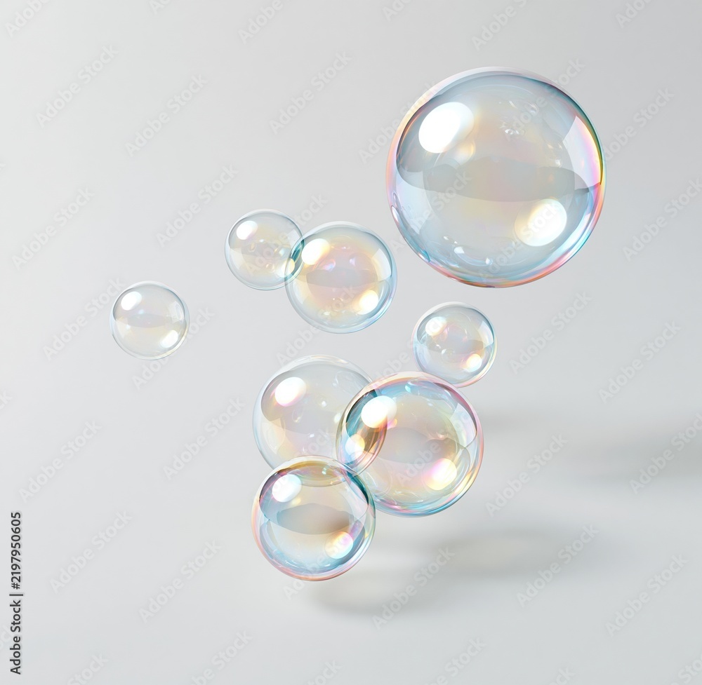 Fototapeta premium Colorful soap bubbles floating against light background