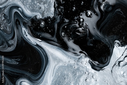 Fluid textures creating dynamic monochrome patterns and bubbles