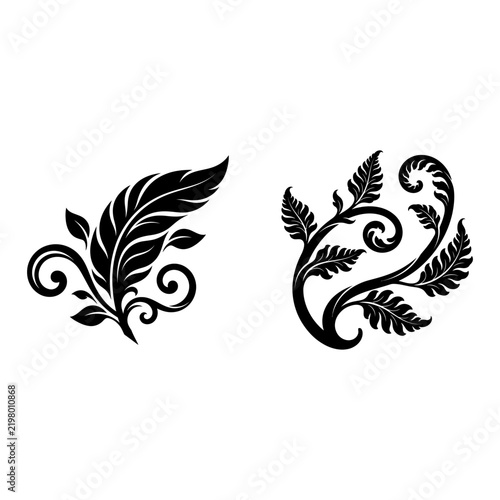 Set of two black hand drawn decorative leaf branch ornaments with floral ornament