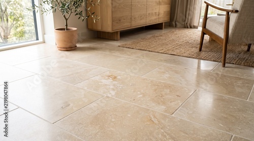 Cream limestone tiles floor. Mineral texture interior design