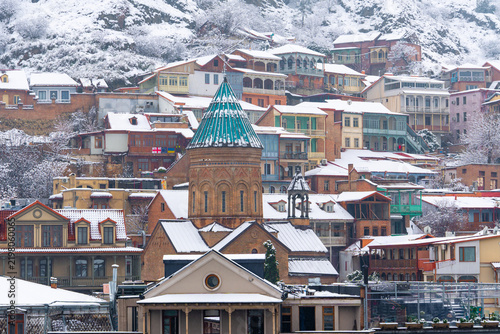 Historic Tbilisi architecture covered in fresh winter snow, Abanotubani