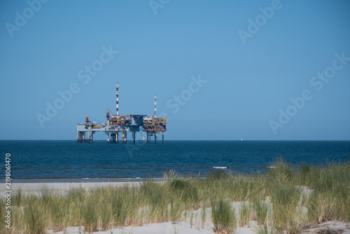 Offshore natural gas production platform in the Dutch North Sea near Ameland, energy infrastructure, oil and gas industry, marine engineering, industrial technology, renewable transition.