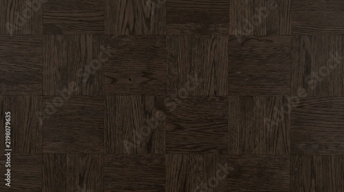 Dark brown wooden parquet floor featuring elegant square tiles arranged in a classic repeating geometric pattern with rich natural oak grain textures and deep earthy tones.